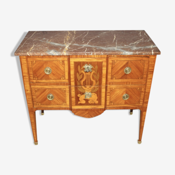 Louis XVI style chest of drawers with music attributes