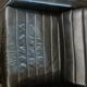 Vintage black leather armchair by Stoll Geroflex