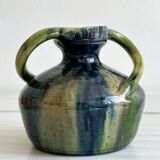 Two-handled ceramic vase with a blue and green gradient pattern.