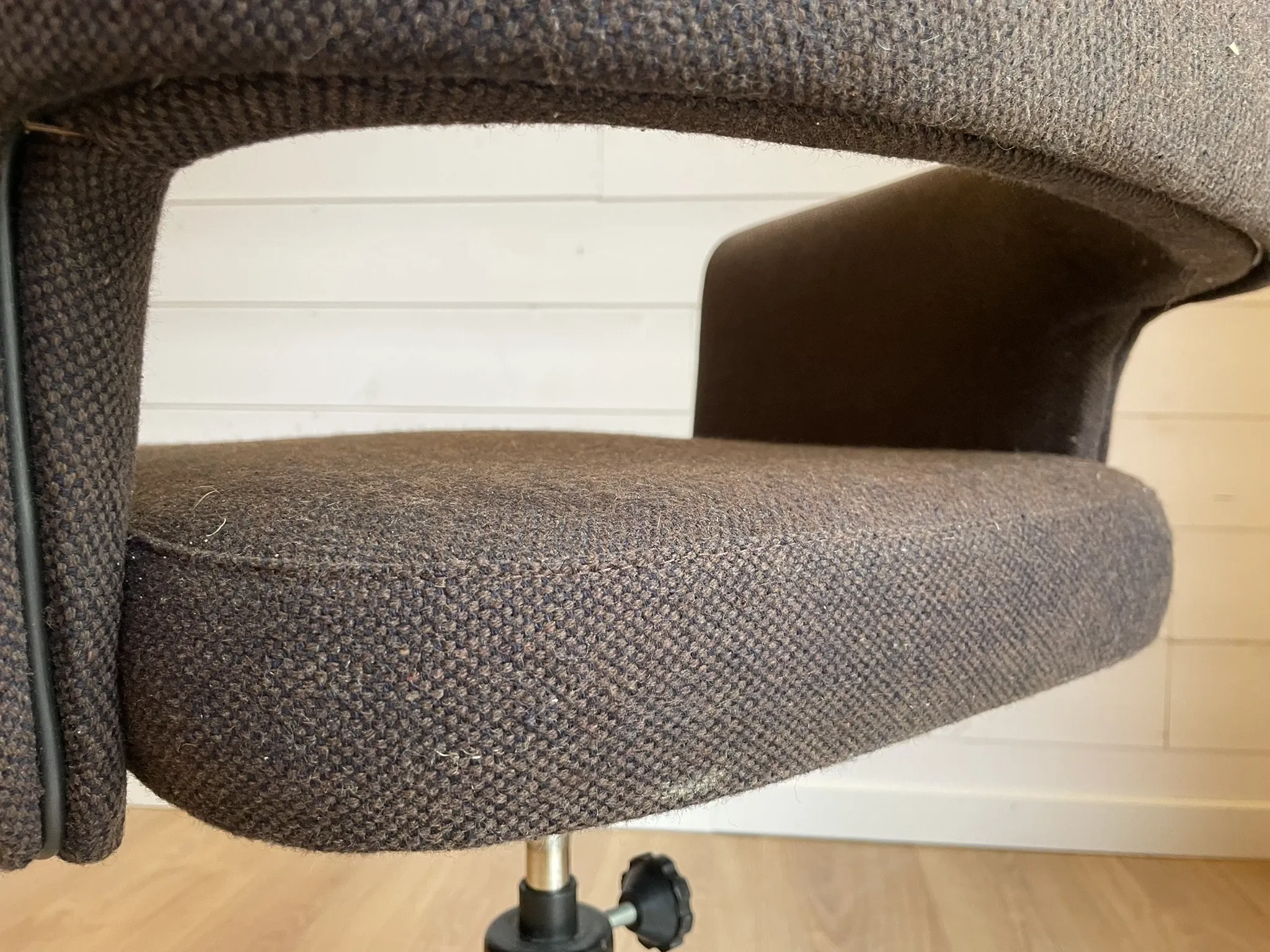 Vintage Mid-Century brown office chair with wheels from the 1970s.