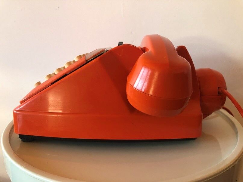 Orange Socotel phone with keys from the 70s 80s