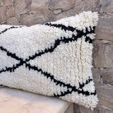 Housse de coussin en laine boho chez un coussin berbère Beni Ourain. Les housses de coussin boho