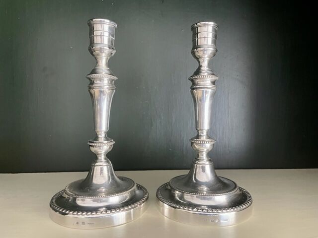 Pair of Christofle silver metal candle holders.
