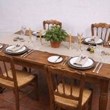 4 rustic farmhouse chairs made of wood and straw