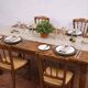 4 rustic farmhouse chairs made of wood and straw
