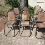 Set of 6 indu chairs in metal and exotic wood.