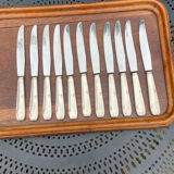 Set of 11 large silver metal knives