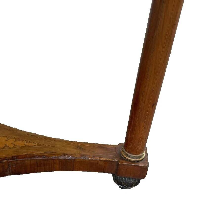 Antique round marquetry Empire table from the early 19th century