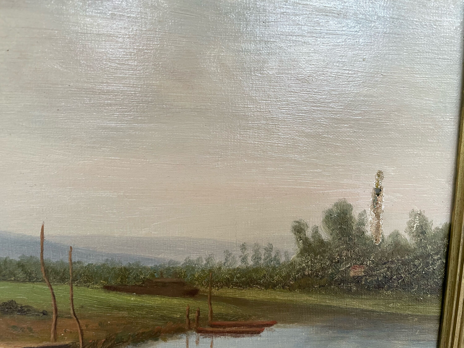 Oil painting of a riverside signed EM