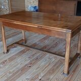 Elm farmhouse table with extensions for 6 to 10 people.