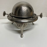 Antique silver sweetener with rolling lid