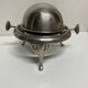 Antique silver sweetener with rolling lid