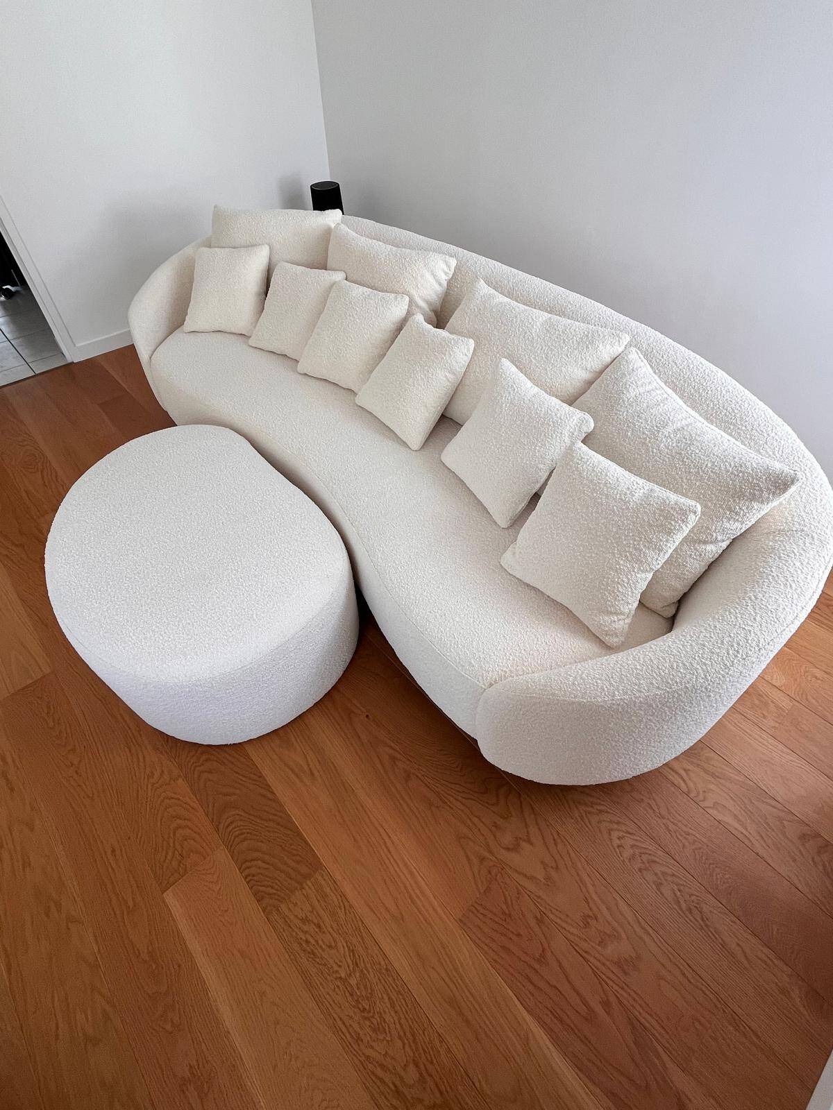 White sofa and pouffe