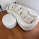 White sofa and pouffe