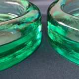 Pair of ashtrays or empty round glass pockets