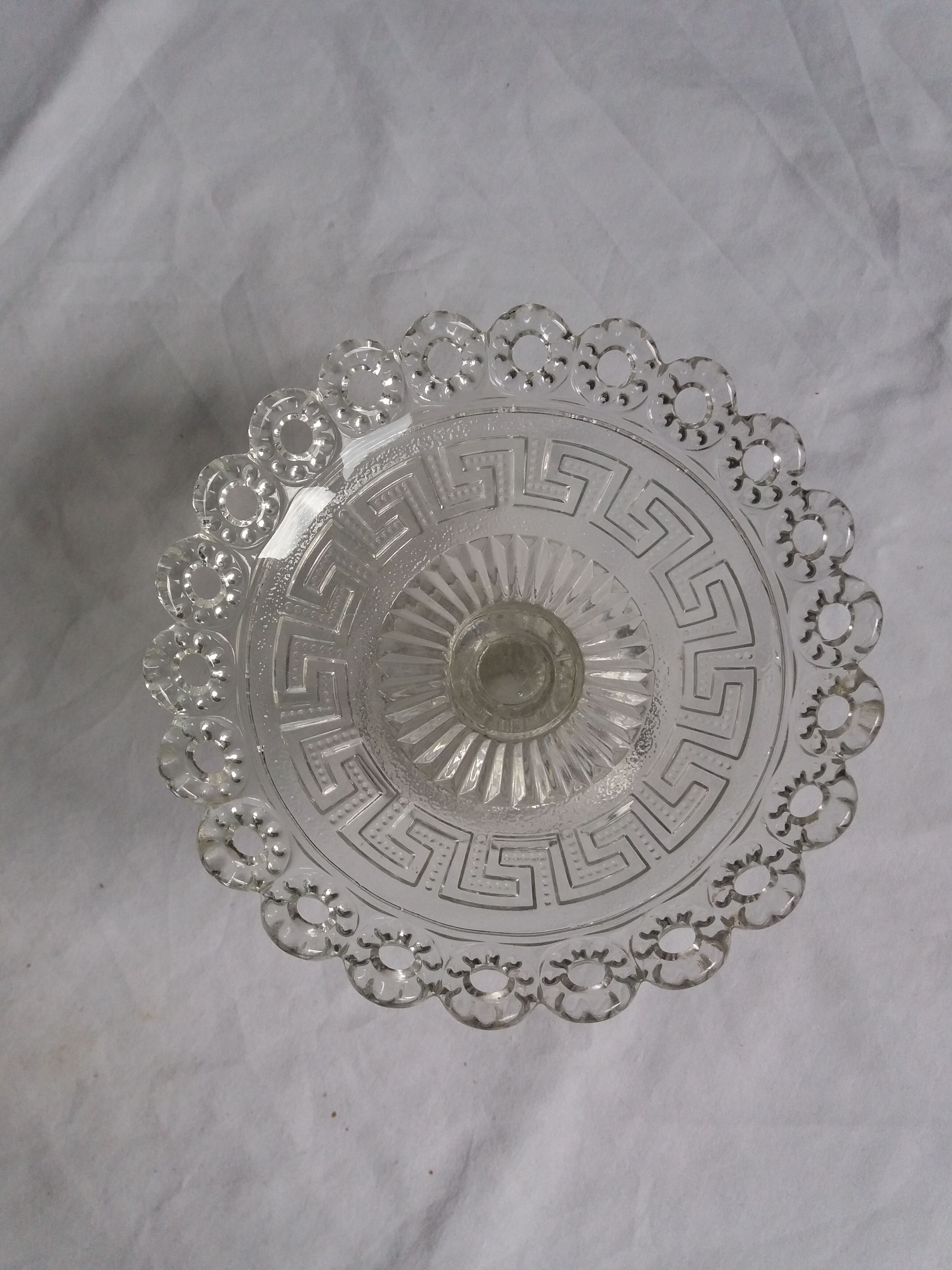 Cup on foot openwork chiseled glass