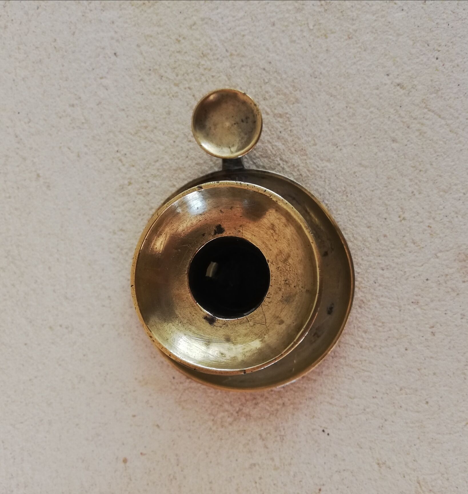 Brass hand candle holder