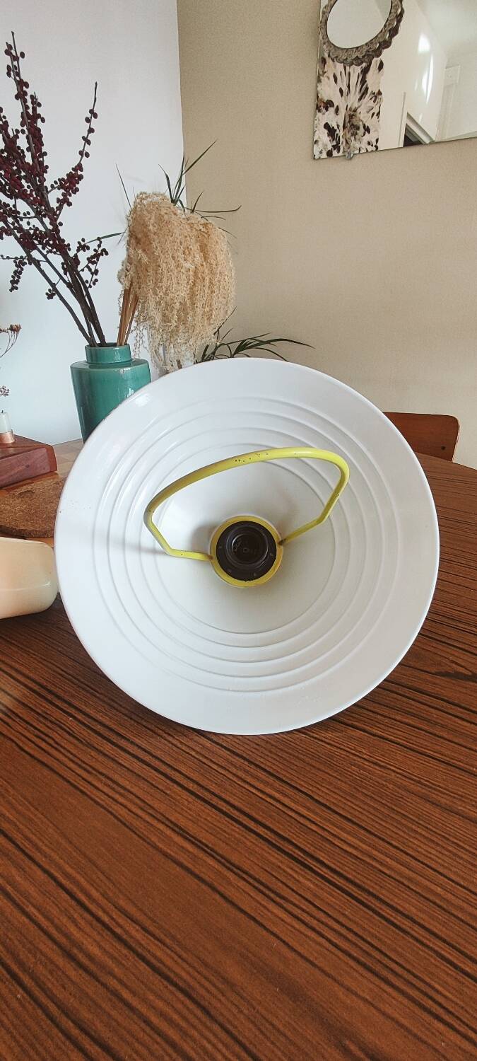 Yellow and white suspension with adjustable height.