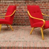 Pair of red armchairs model 6953 by Jaroslav Smidek published by TON