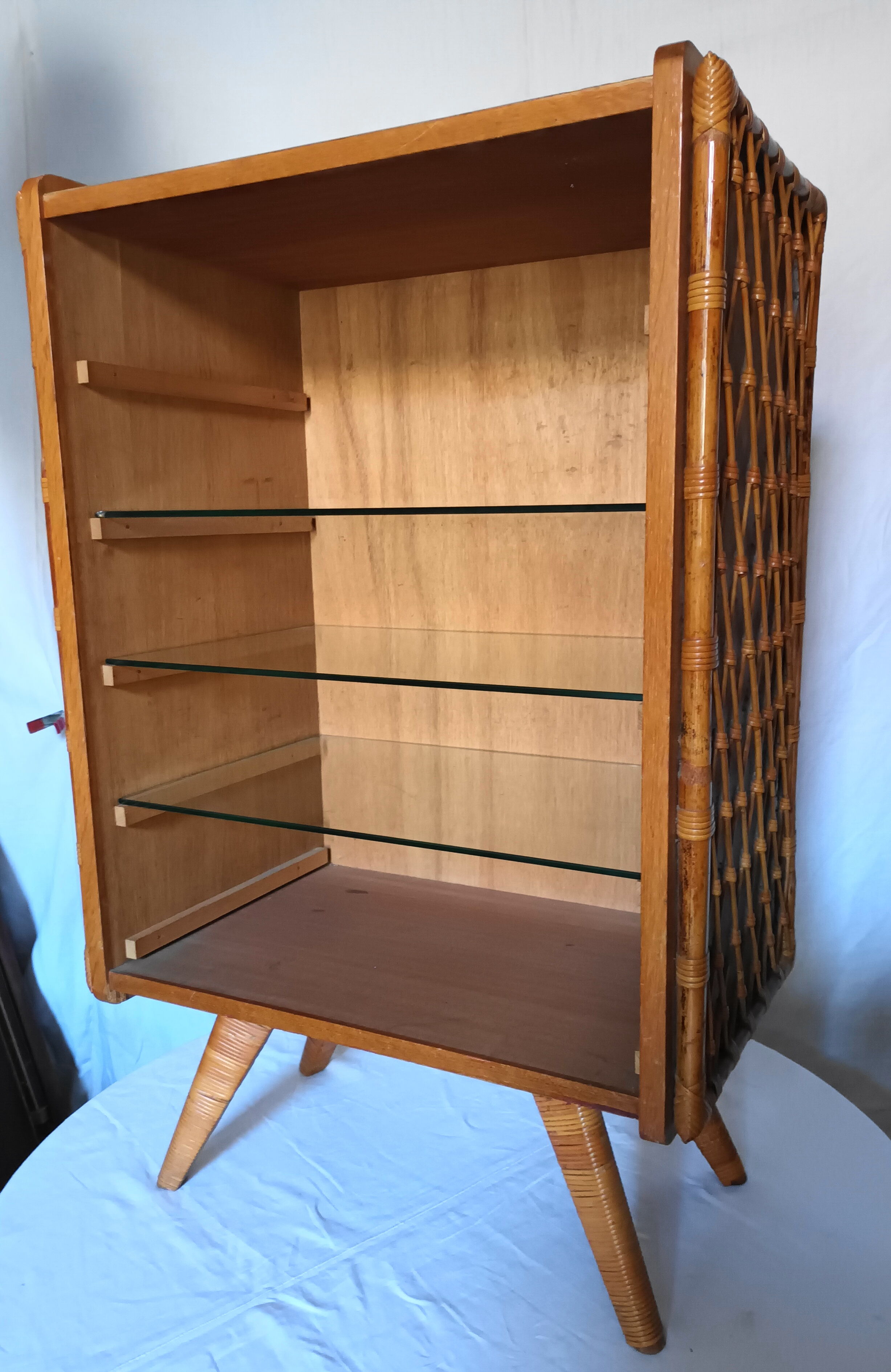Bibus has 3 wooden and bamboo shelves from the 50s