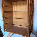Bibus has 3 wooden and bamboo shelves from the 50s