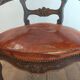 Fauteuil de bureau 1920 sculpté à tête de griffon