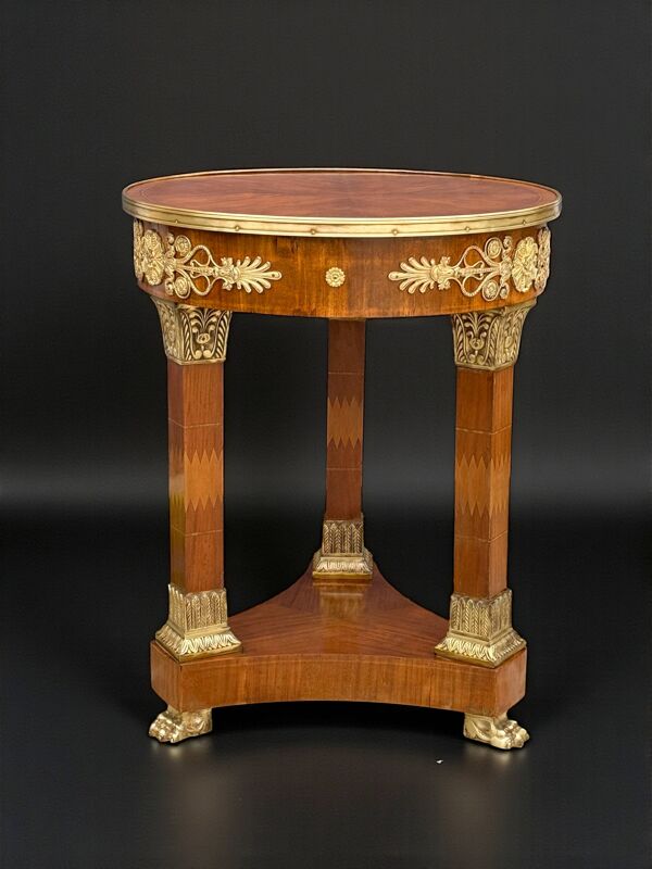 Guéridon circulaire empire du XIXème en marqueterie orné de bronze doré