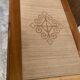 Table en bois style bambou et paille tressée