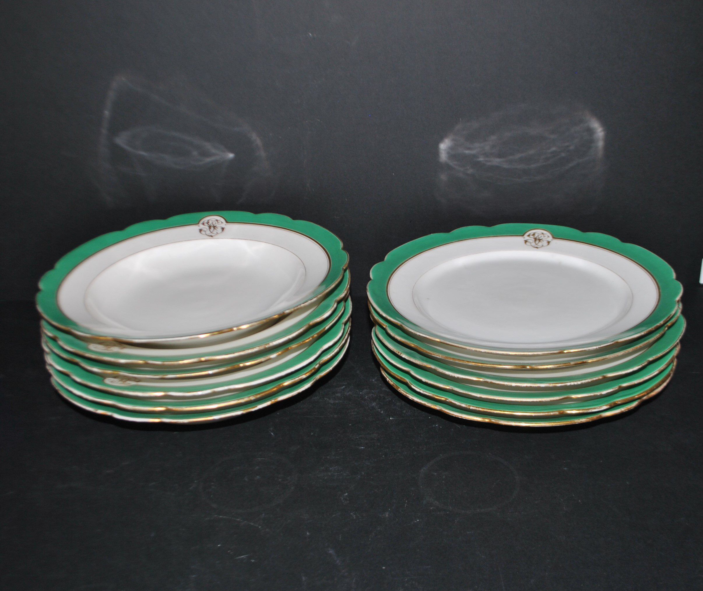 Paris porcelain set of 6 flat plates and 6 deep plates with JC gold monogram.
