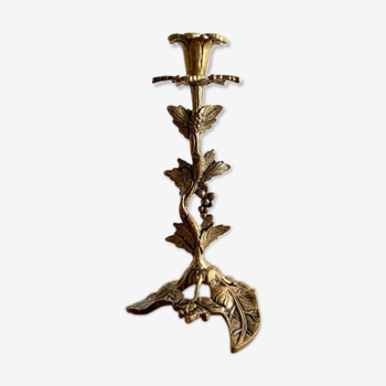 Candlestick in gilt bronze decorated with leaves