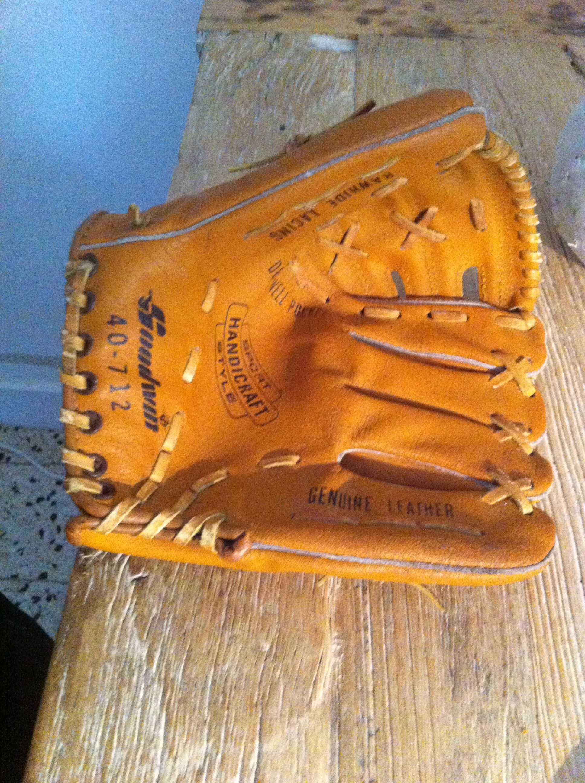 Vintage base ball glove with vintage softball