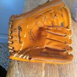 Vintage base ball glove with vintage softball