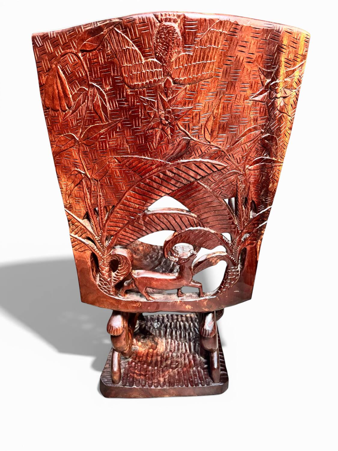 Pair of carved African armchairs