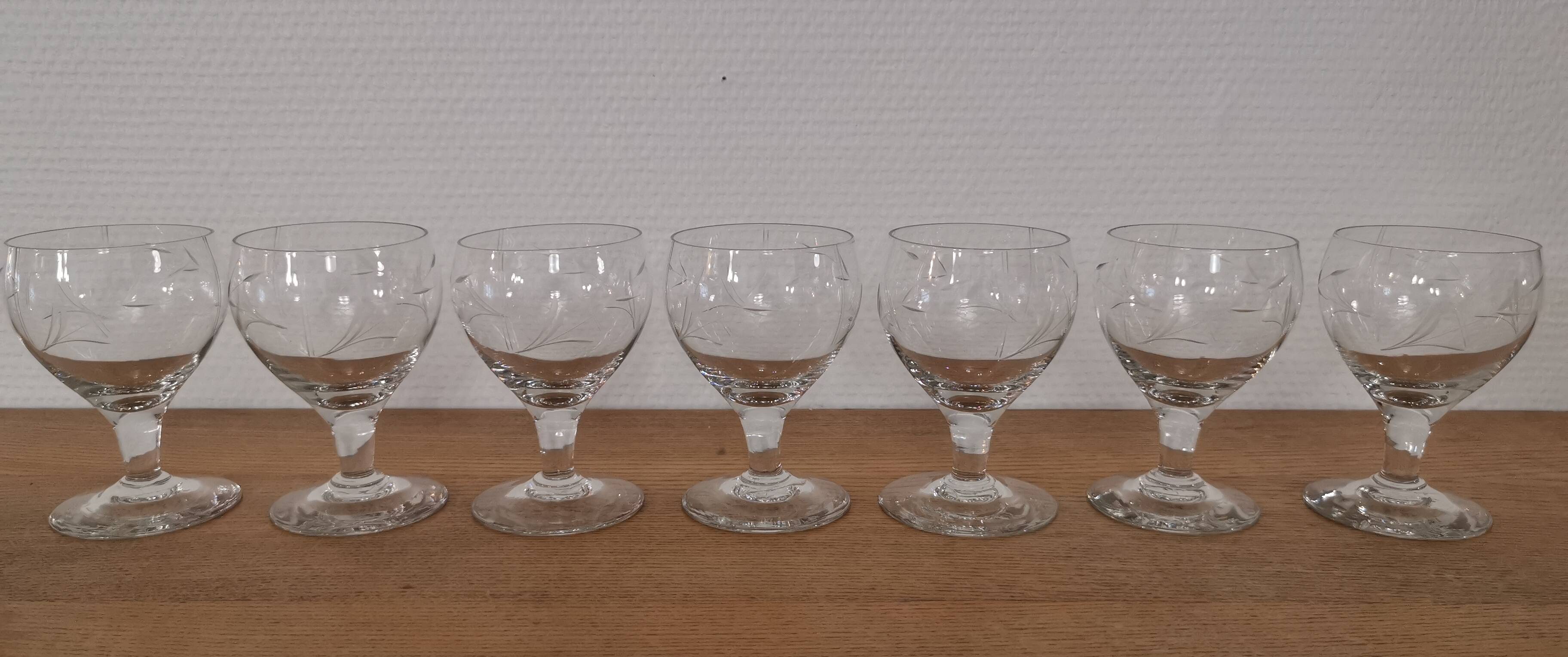 Set of 7 finely engraved vintage wine glasses