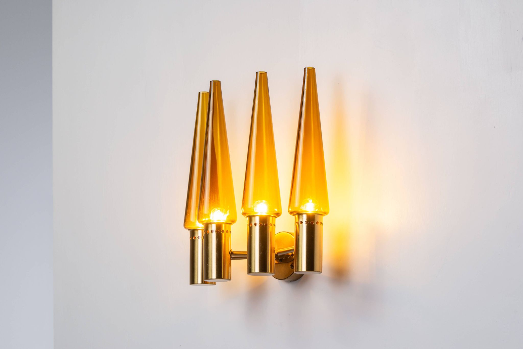 Hans Agne Jakobsson wall lamp made from brass with orange shades
