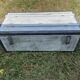 Restored wooden trunk patinated grey