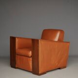 Paire de fauteuils Art Déco en cuir. Années 40.