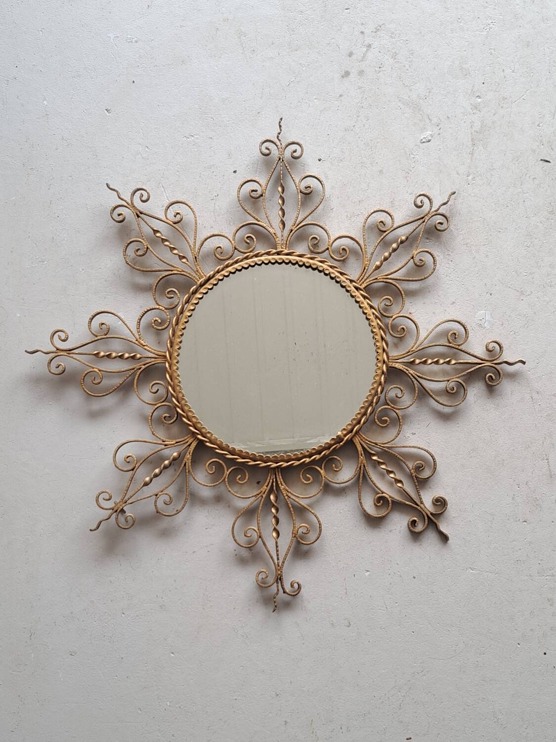 Vintage gold metal sun mirror