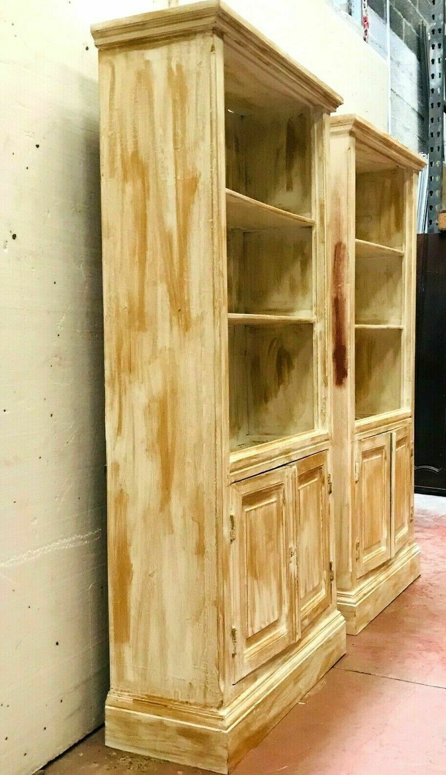Pair of store windows in patinated fir