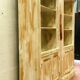 Pair of store windows in patinated fir