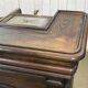 Early 20th-century oak bar counter with period zinc and tin cladding.