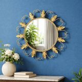 Circular gold metal mirror with floral decoration – 1960s