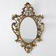 Miroir ovale en métal doré de style rococo, Italie, 20e siècle
