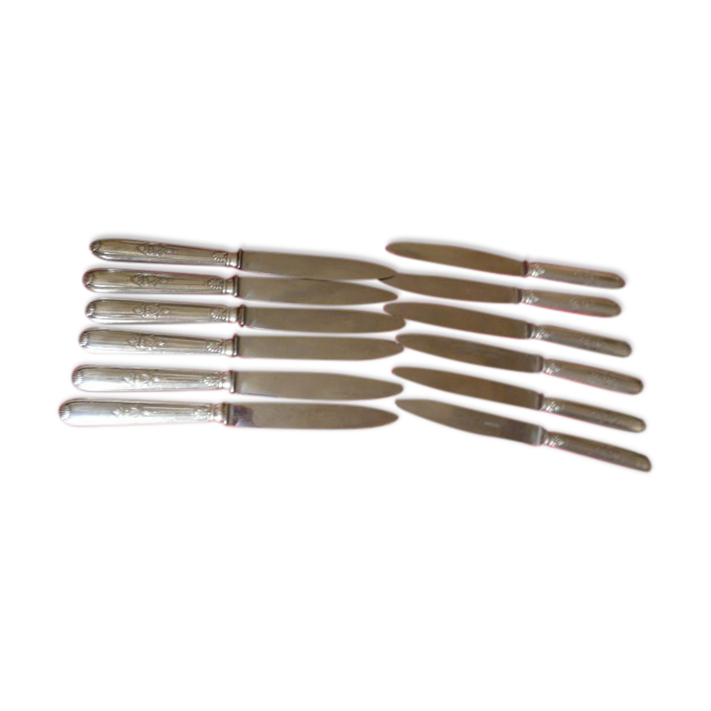 Series of 12 antique silver metal knives in their box