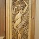 Vintage hand-carved wardrobe in Art Nouveau style.
