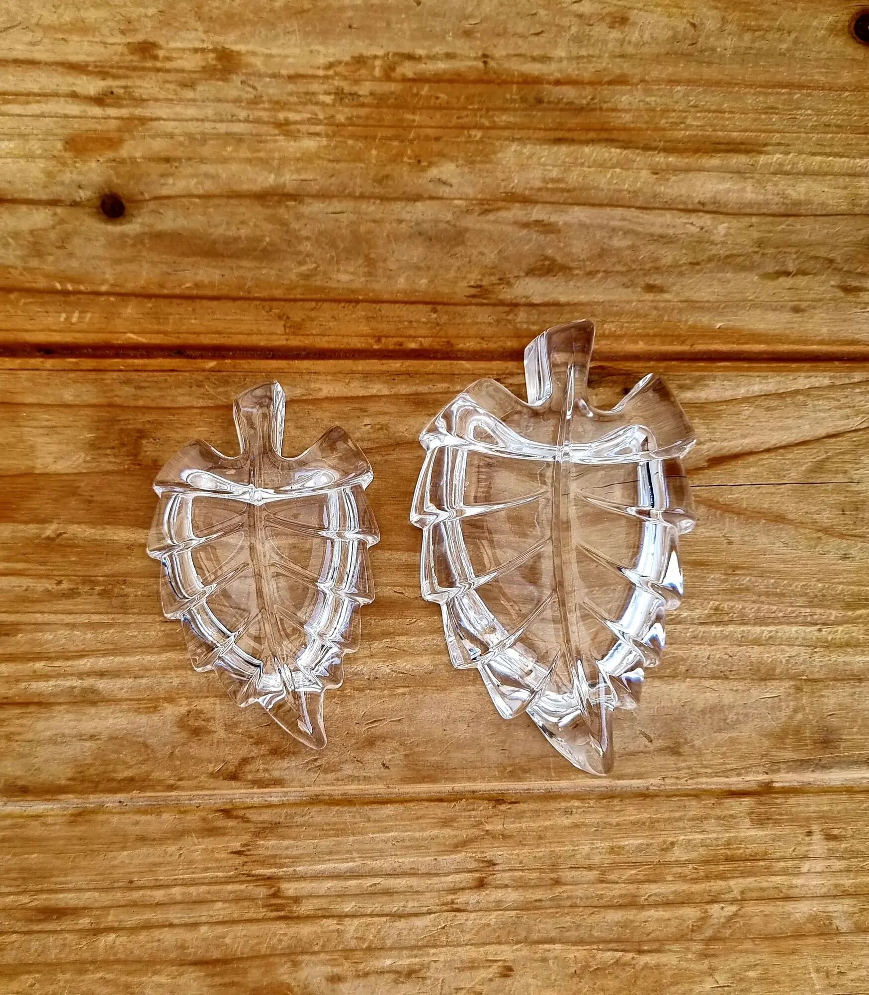 Pair of vintage leaf-shaped glass bowls from the 1970s.