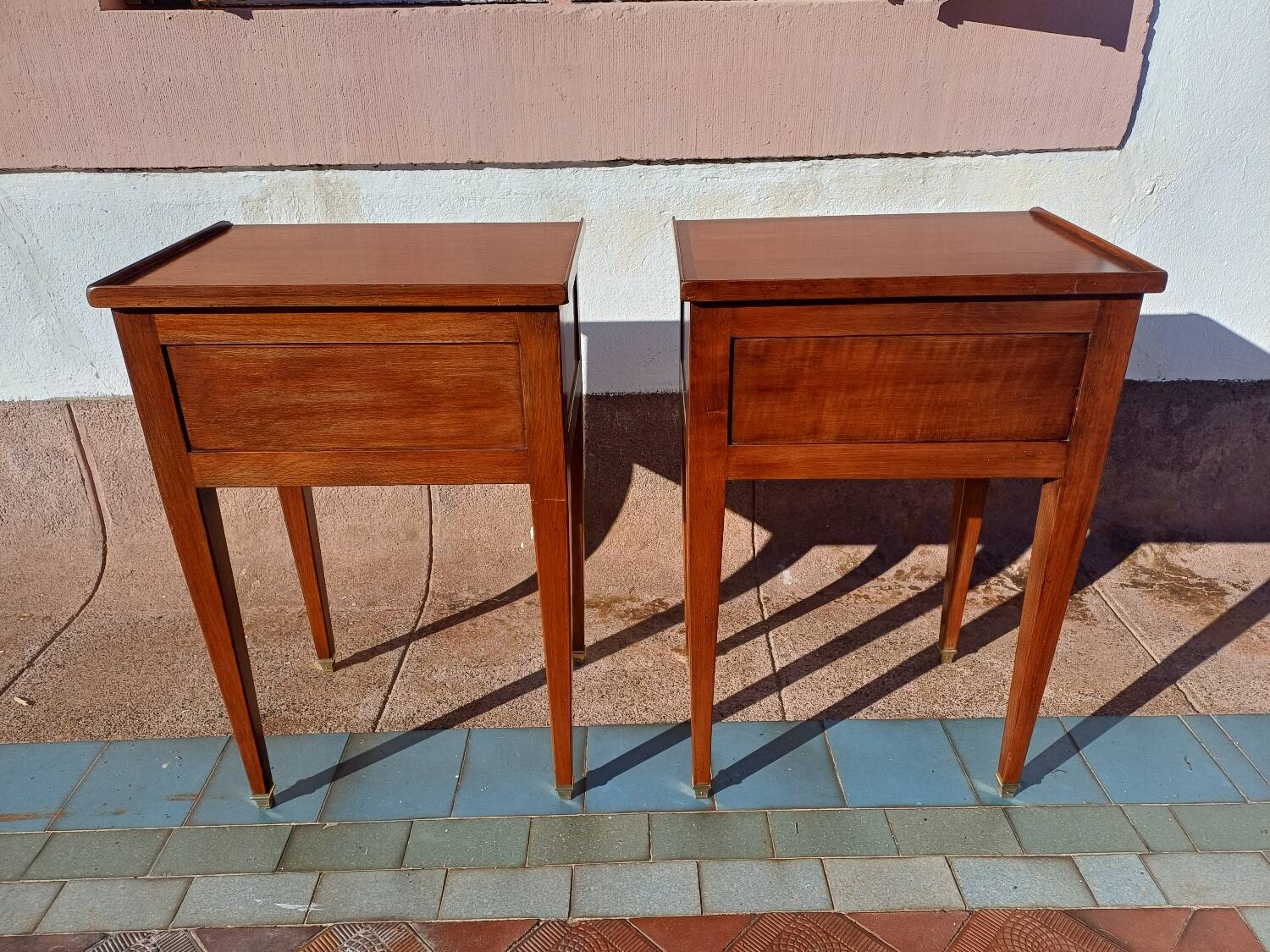 Pair of Louis XVI style oak bedside tables with 2 drawers and spindle legs