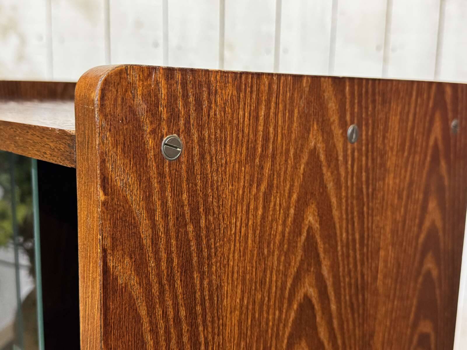 Small English oak library from the 1960s with sliding doors.