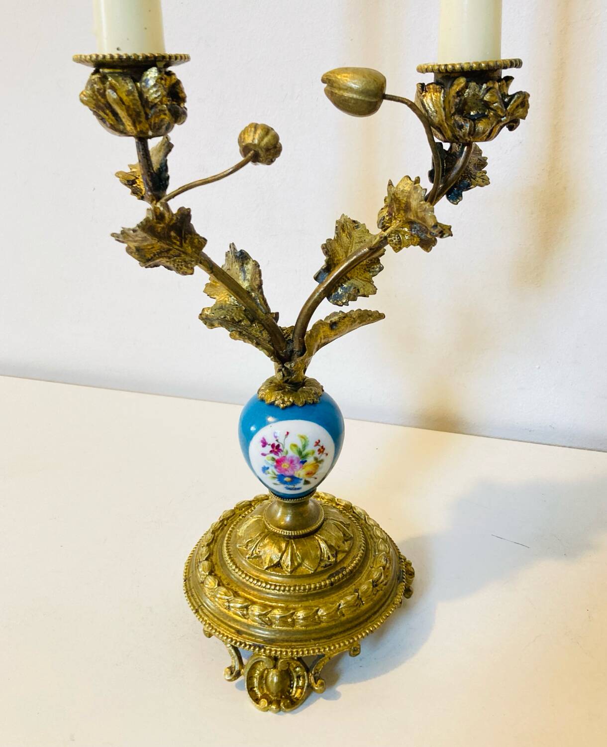 19th century candle holders in gilded bronze and porcelain