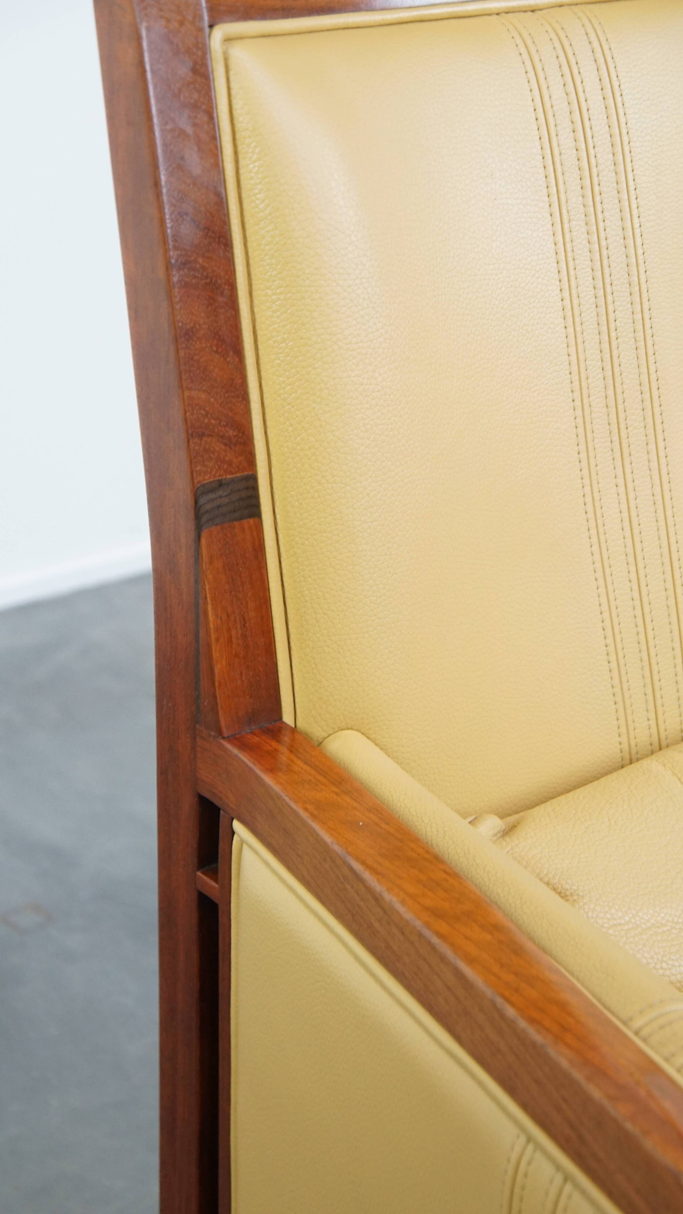 Art Deco armchair in yellow leather with high back